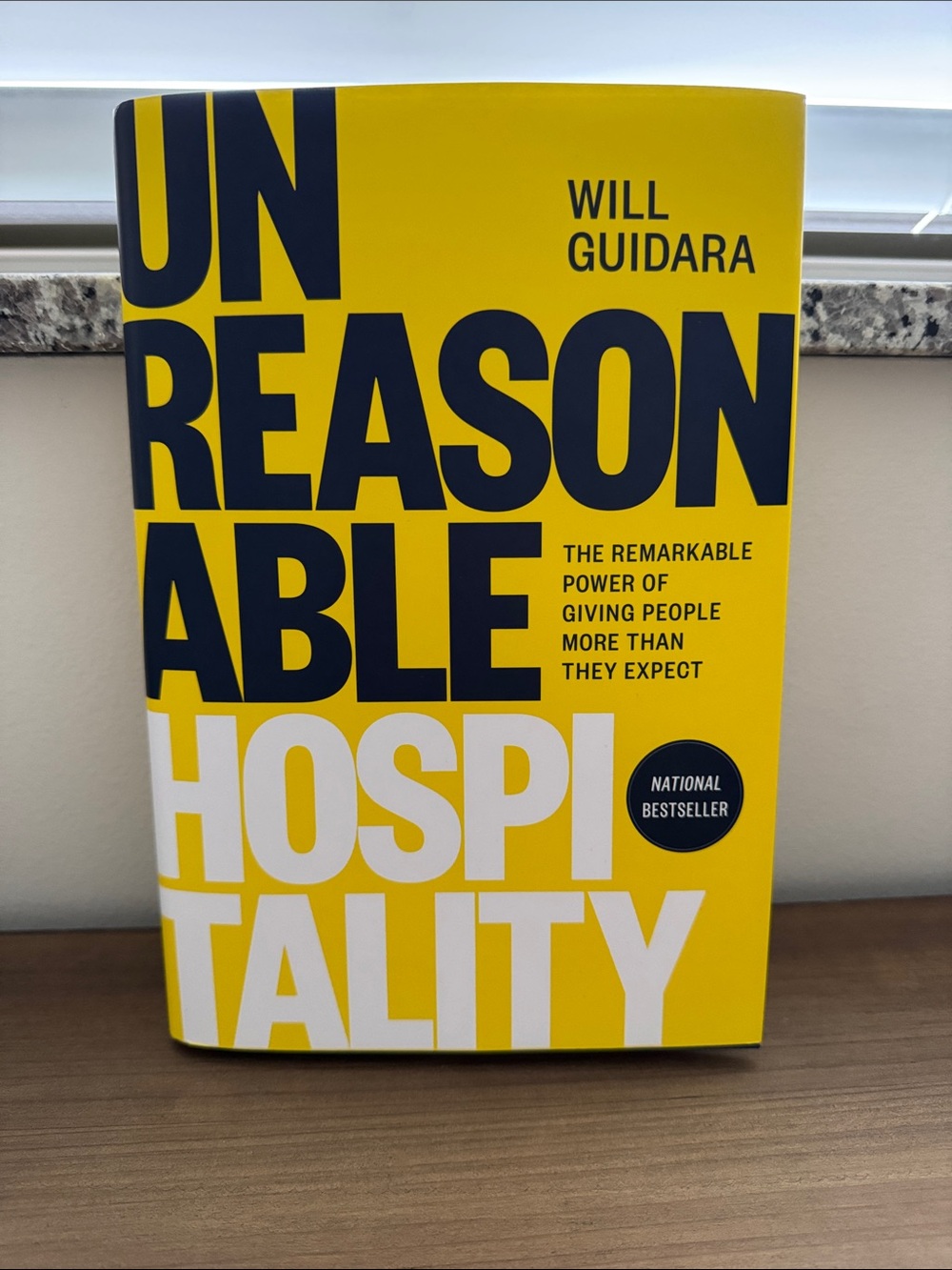 Unreasonable Hospitality by Will Guidara - Yellow & Black Hardcover